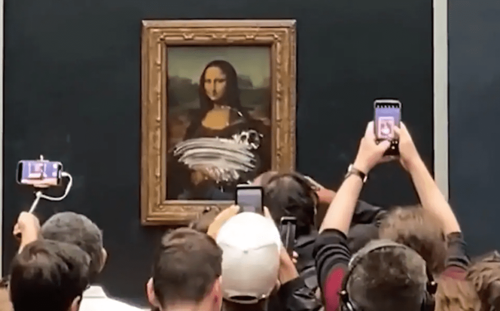 mona-lisa-attacked-by-climate-nut-job