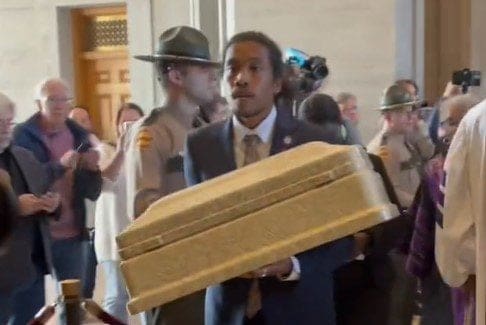 previously-expelled-rep.-justin-jones-attempts-to-bring-child-size-casket-inside-tennessee-house-chamber-(video)