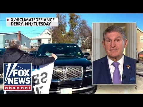 climate-protesters-swarm-joe-manchin-in-diner
